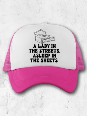 A Lady In The Streets. Asleep In The Sheets. (Hat)